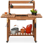 Best Choice Products Mobile Garden Potting Bench, Outdoor Wood Workstation Table w/Sliding Tabletop, 4 Locking Wheels, Food Grade Dry Sink, Storage Shelves - Brown