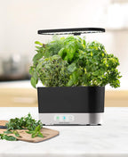AeroGarden Harvest Indoor Garden Hydroponic System with LED Grow Light and Herb Kit, Holds up to 6 Pods, Black