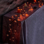 Hairui Lighted Halloween Garland with 48L Orange and Purple Bi-Color LED Lights 8 Functions, Black Glittered Garland Lights Battery Operated 6FT for Indoor Outdoor Halloween Party Decoration
